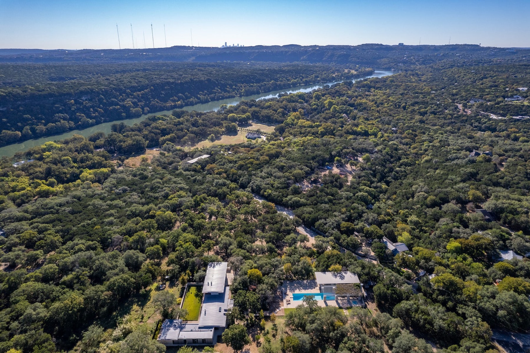 Aerial View Of Lake Travis And A Modern Home Located At 2508 N. Cuernavaca Drive